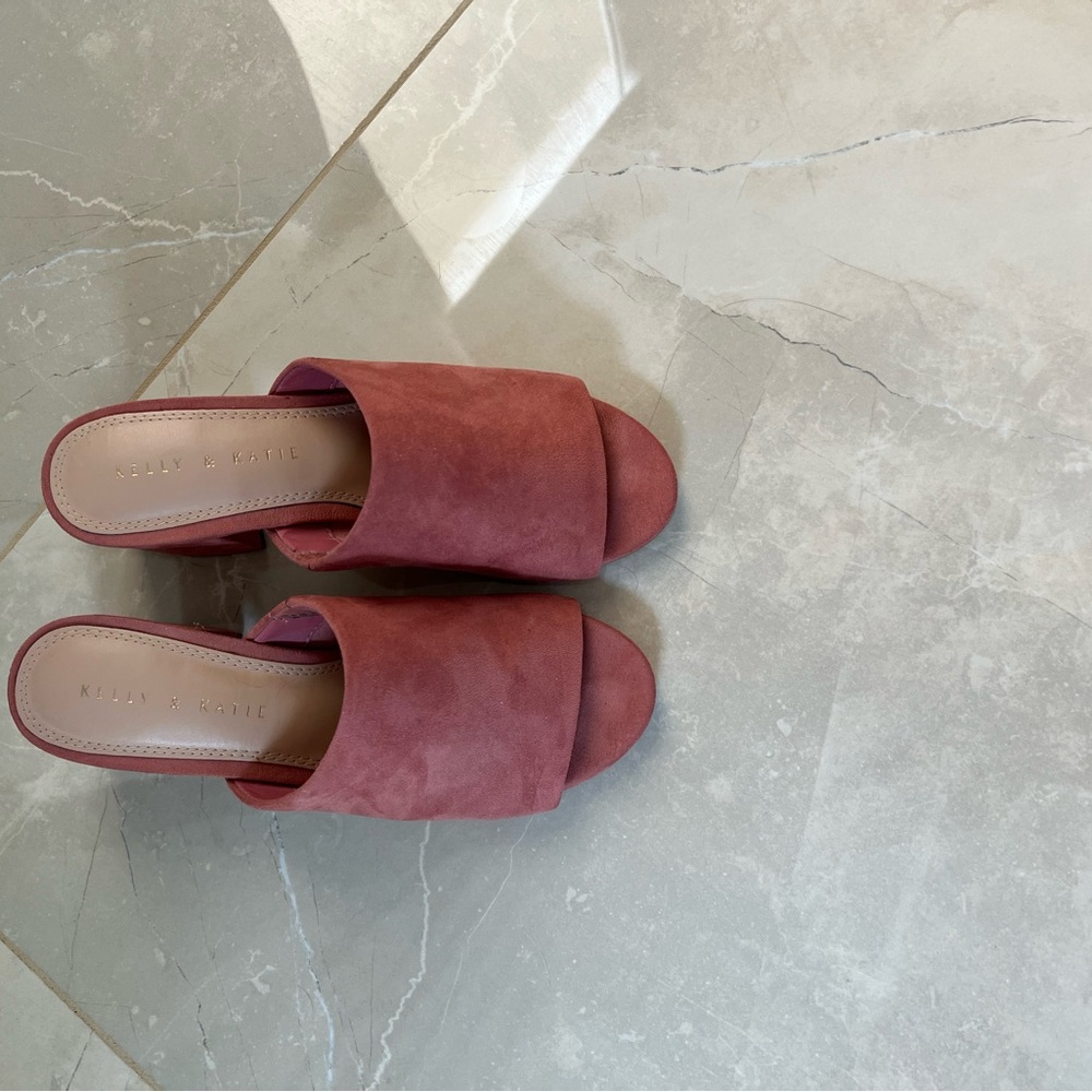 Light rosé colored mules